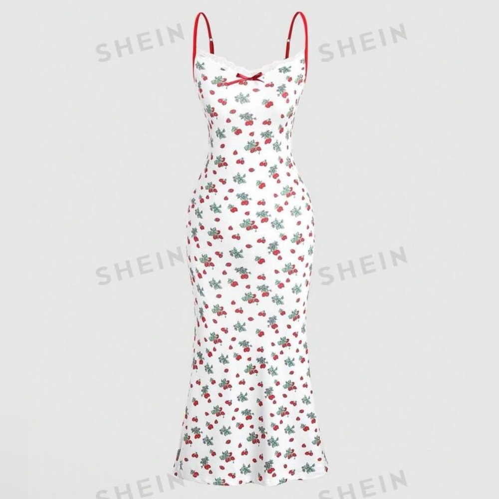 White dress with strawberry design and red trim
